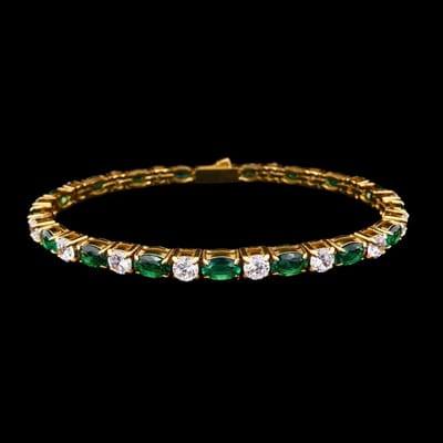 Victoria Valenza Goudkleurige RVS Tennisarmband met Groene Zirkonia Stenen - Armband - Goudkleurig - RVS - Tennisarmband - Zirkonia