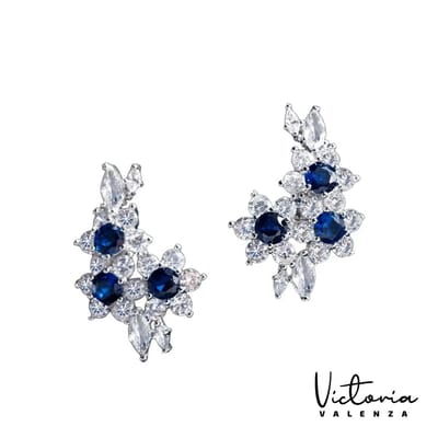 Victoria Valenza Fiore Luxe Oorbellen Dames Messing Oorknopjes Dames Oorringen - Blauwe Steen - Kleur Zilver - 1 Paar