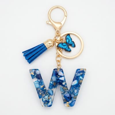 Blauwe letter W sleutelhanger met kwastje en vlinder – sleutelhanger voor dames – goudkleurige metalen keychain met acryl initiaal W hanger, decoratieve bedel en tassel