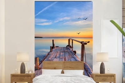Behang - Fotobehang Water - Steiger - Vogels - Zonsondergang - Horizon - Breedte 200 cm x hoogte 300 cm