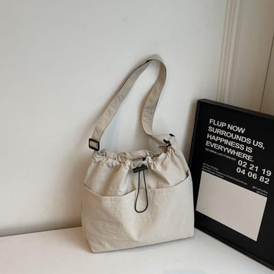 Nieuwe Zomer Grote Capaciteit Trekkoord Emmer Tas voor Dames Japanse Casual Crossbody Tas Street Schoudertas Commutertas gray