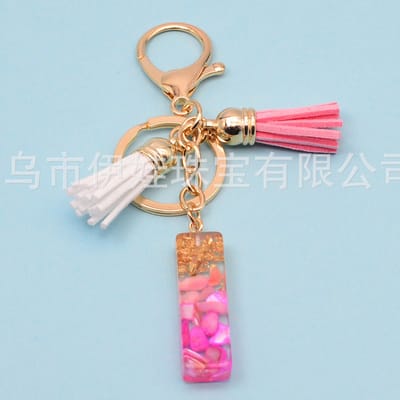 Sleutelhangers of voor je tas van A tot Z - met een pompon of kwastje - met letter - mooi design - handgemaakt - sleutelhangers - design - mode - goud - zwart - blauw - roze- rood