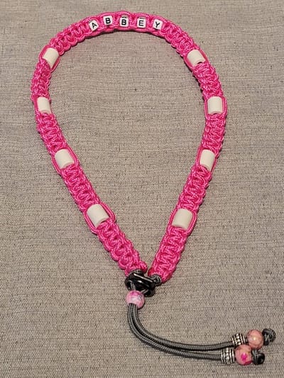 Anti- Vlooienband Tekenband Paracord met Naam 25-30CM ROZE (GEEN RECHT VAN RETOUR)
