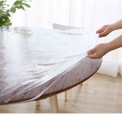 Rond, wasbaar, weerbestendig tafelkleed met elastiek; ideaal voor tuin en eetkamer; 90-110 cm breed; transparant.
