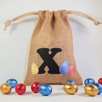 Paaszakje - letter X - pasen, paaseitjes, paaseizakje, cadeautje, feestdag, paashaas, paaseieren, verpakken