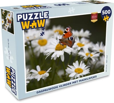 Puzzel Dagpauwoog vlinder met madeliefjes - Legpuzzel - Puzzel 500 stukjes
