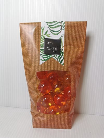 Leuk zakje met 25 badparels citrus geur geel en oranje leuk als geschenk of voor jezelf