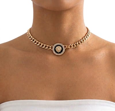 Goudkleurige schakel ketting voor dames en heren met ronde hanger leeuw en strass