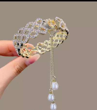 Clip met stras steentjes knot Goud - Clip in haar - Stras steentjes clip in