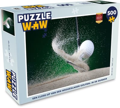 Puzzel Een close-up van een weggeslagen golfbal in de bunker - Legpuzzel - Puzzel 500 stukjes