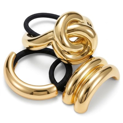 Goudkleurige haar elastiek met metalen cuff – elastische haar band dames – metallic paardenstaart accessoire – glanzend goud haar sier cuff in knoop en afgerond design