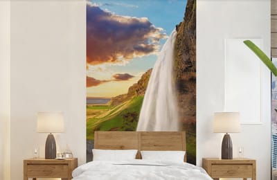 Behang - Fotobehang Waterval - Rots - Zonsondergang - Bergen - Oranje - Breedte 120 cm x hoogte 240 cm