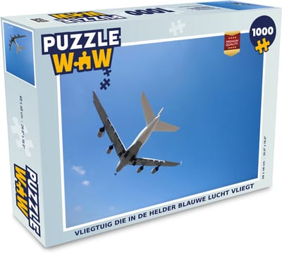 Puzzel Vliegtuig die in de helder blauwe lucht vliegt - Legpuzzel - Puzzel 1000 stukjes volwassenen