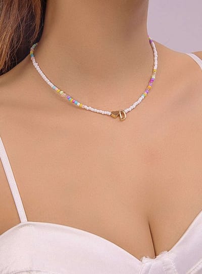 Boho ketting kraaltjes met hanger letter D