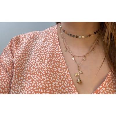Laagjes ketting met een roos & sterretjes | goud gekleurd