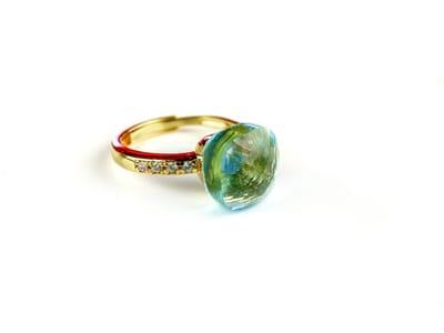 Ring in zilver geelgoud verguld model Pomellato met lichtblauwe steen en cubic zirconia
