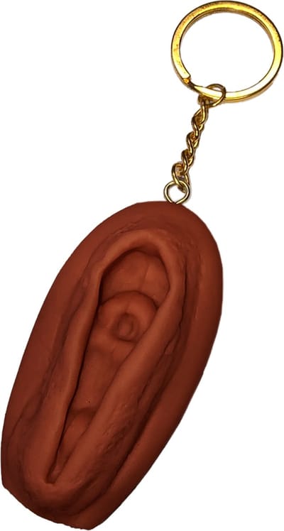 Humoristische Donkerbruine Silicone Vulva Sleutelhanger – Ondeugende Vaginale Gadget voor Feestjes & Cadeaus