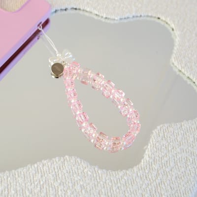 xoxo Wildhearts koord - Girly Girl - Phone Charm (small) - bedeltje geschikt voor iPhone - Parelketting / Kralenketting met strikjes - kort telefoonkoord geschikt voor Samsung - geschikt voor alle telefoonmodellen - Wit / Roze