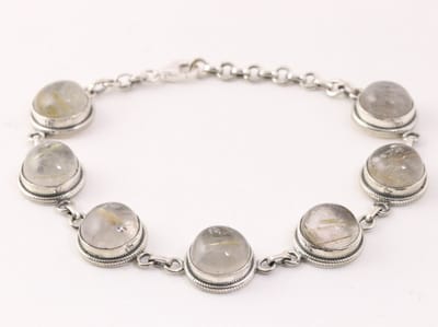Bewerkte zilveren armband met gouden rutielkwarts