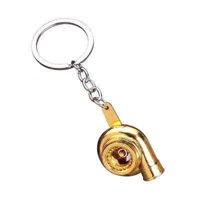 Goudkleurige sleutelhanger turbocharger vorm met metalen sleutelring en korte schakelketting, sleutelhanger voor heren en dames, compact accessoire met mechanisch ontwerp en glanzend industrieel detail