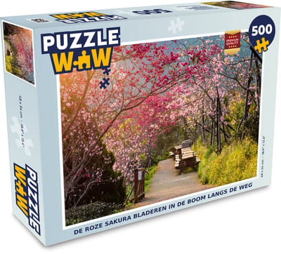 Puzzel De roze sakura bladeren in de boom langs de weg - Legpuzzel - Puzzel 500 stukjes