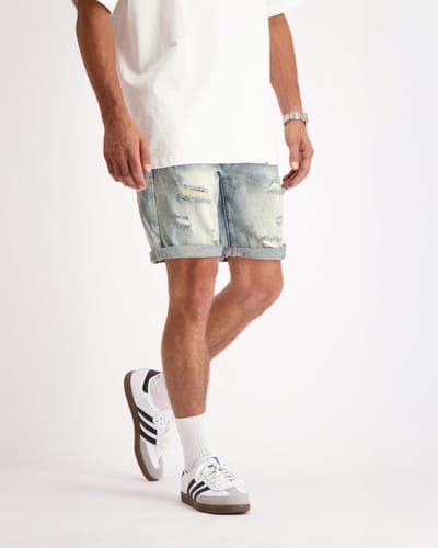 DISTRESSED DENIM SHORTS