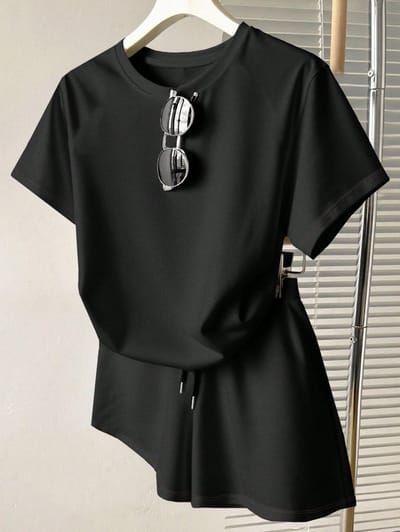 Stijlvolle en Comfortabele Zwarte Asymmetrische T-shirt met Ronde Hals en Korte Mouwen voor Dames - S-M