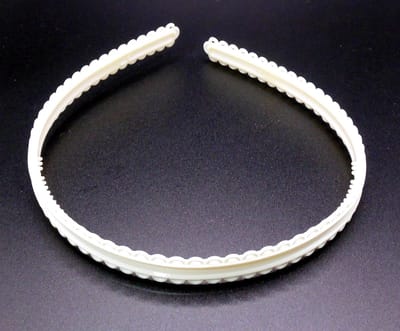 Diadeem met patroon cremekleur