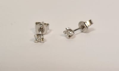 Oorknoppen - witgoud - 14 krt - Naturel diamant 0.16 crt totaal - solitaire - R&C - OOR0012 - uitverkoop Juwelier Verlinden St. Hubert - van €1076,= voor €599,-