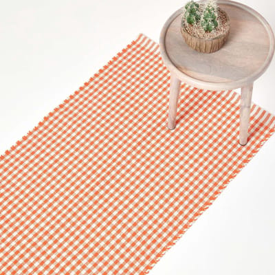 Homescapes Oranje en wit geruit handgeweven katoenen vloerkleed, 66 x 200 cm