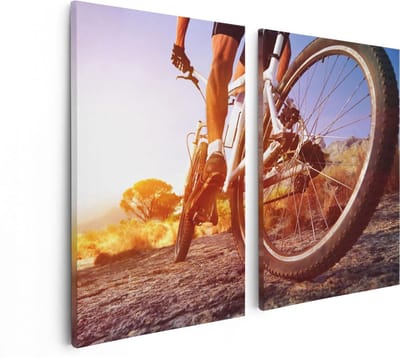 Artaza Canvas Schilderij Tweeluik Mountainbike Fietser op Stenen bij Zonsopgang - 80x60 - Foto Op Canvas - Canvas Print
