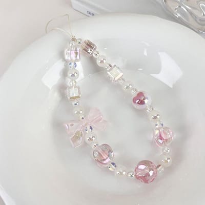 Chaîne de téléphone portable couleur bonbon douce, breloques mignonnes avec nœud et perles, pendentif pour téléphone portable, cordon anti-perte, bijoux rose