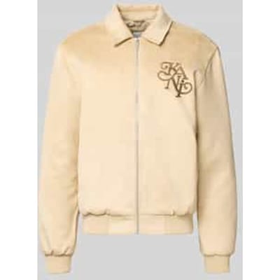 Jack in leerlook met labelstitching