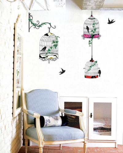 Barokke muurstickers met gekooide vogels voor decoratie.