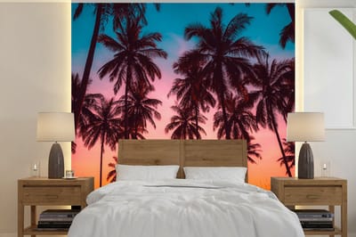 Behang - Fotobehang Palmboom - Zonsondergang - Horizon - Strand - Oranje - Roze - Breedte 300 cm x hoogte 300 cm
