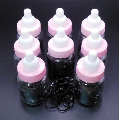 Babyflesjes transparant-roze-wit gevuld met zwarte haarelastiekjes set van 8 stuks.