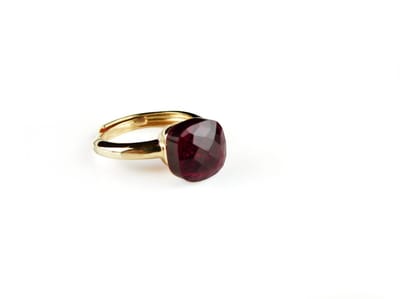 Ring in zilver geelgoud verguld model pomellato rode steen