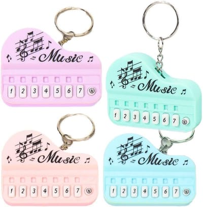 Mini Toetsenbord Sleutelhanger - Piano Speelgoed Hanger - Muziek Maken - Draagbaar Muzikaal Speelgoed - 62 cm - Roze
