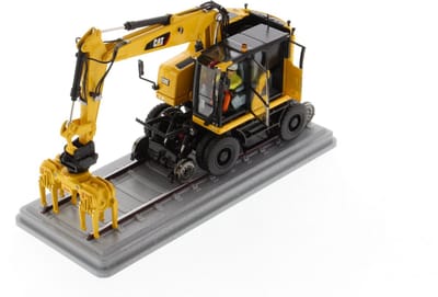 Cat M323F Mobiele kraan voor op het spoor - 1:50 - Diecast Masters - High Line Series - signaalgeel