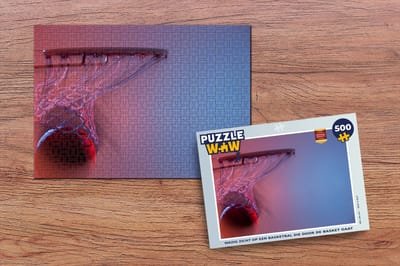 Puzzel Wazig zicht op een basketbal die door de basket gaat - Legpuzzel - Puzzel 500 stukjes