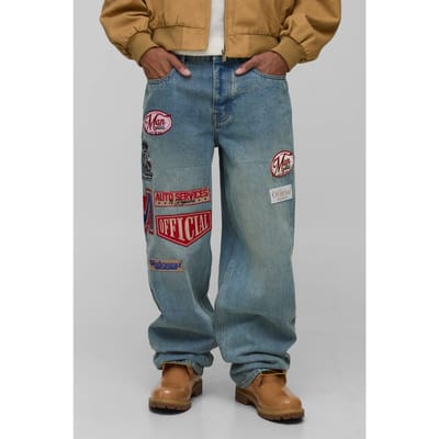 Relaxte Varsity Badge Gewassen Denim Jeans | Stonewash | Size 28R