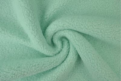 10 meter teddy bont stof - Licht mint - 160cm breed
