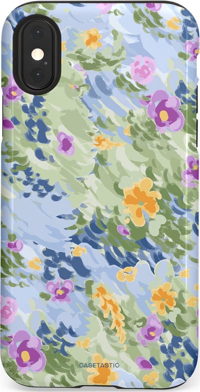 Casetastic Hoesje Geschikt voor Apple iPhone X/Xs - Stijlvolle Beschermende Duo-layer Case - Zonnige Bloemtuin