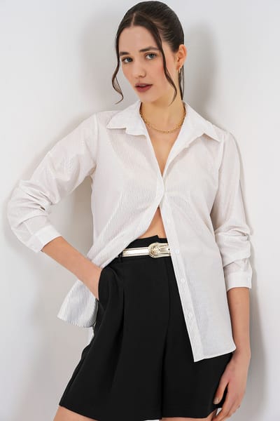 Oversized gestreepte blouse met knopen