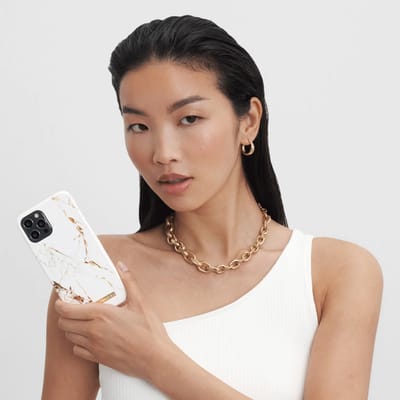 iDeal of Sweden Fashion Backcover geschikt voor Apple iPhone 15 - Carrara Gold