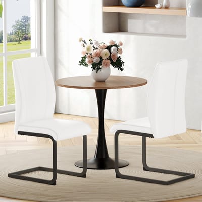 2-delige set witte eetkamerstoelen van kunstleer: zwarte metalen poten, ergonomisch ontwerp, comfort en esthetiek in één.