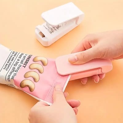 Mini Zakken Sealer - Draagbaar- Hitte Verpakking Sealer - Voor Voedselzakken - Ideal voor onderweg - Voedsel veiligheid - Sealer - Roze - 1 stuk