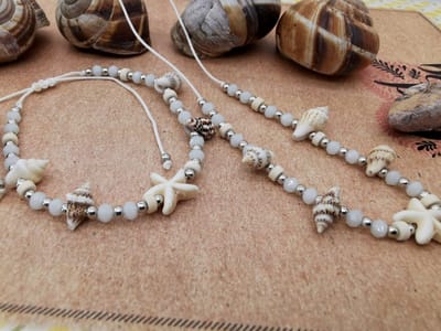 Set: Armband en Enkelbandje - Zomer - Ibiza style - met geribde fuik Horn schelp, facet kralen, Zeester, wit kleur touw.