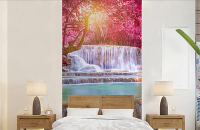 Behang - Fotobehang Waterval - Regenboog - Bomen - Roze - Natuur - Breedte 120 cm x hoogte 240 cm