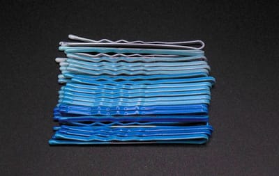 Schuifspelden blauwe tinten per 20 stuks.
